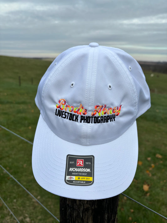 White hat with circus stitching